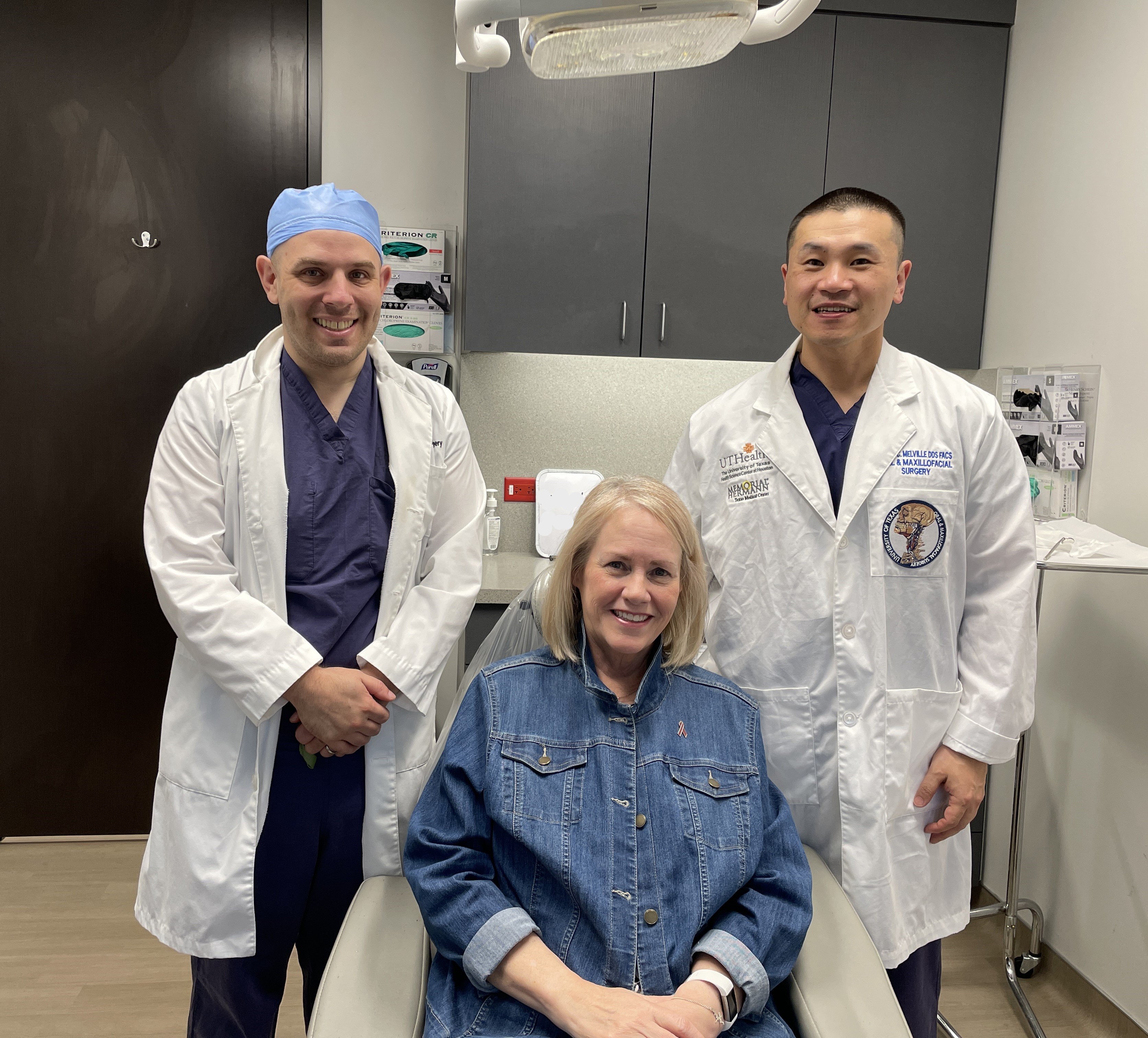 Linda Pellerito, center, is now cancer-free thanks to surgery by James Melville, DDS, right, and the care of Scott Manis, DDS, MD, left, and encourages people to have regular dental checkups. (Photo by UTHealth Houston)