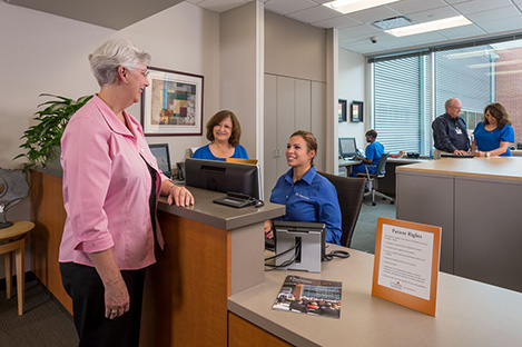 Patient talking to UT Dentists Imaging Staff